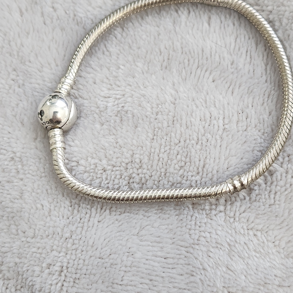 Pandora disney bracelate and charms
